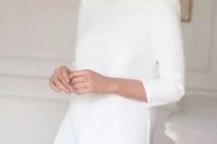 a very cool and simple plain mini dress with a high neckline and short sleeves plus a ruffle edge is a stylish casual idea
