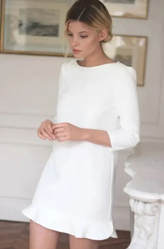 a very cool and simple plain mini dress with a high neckline and short sleeves plus a ruffle edge is a stylish casual idea