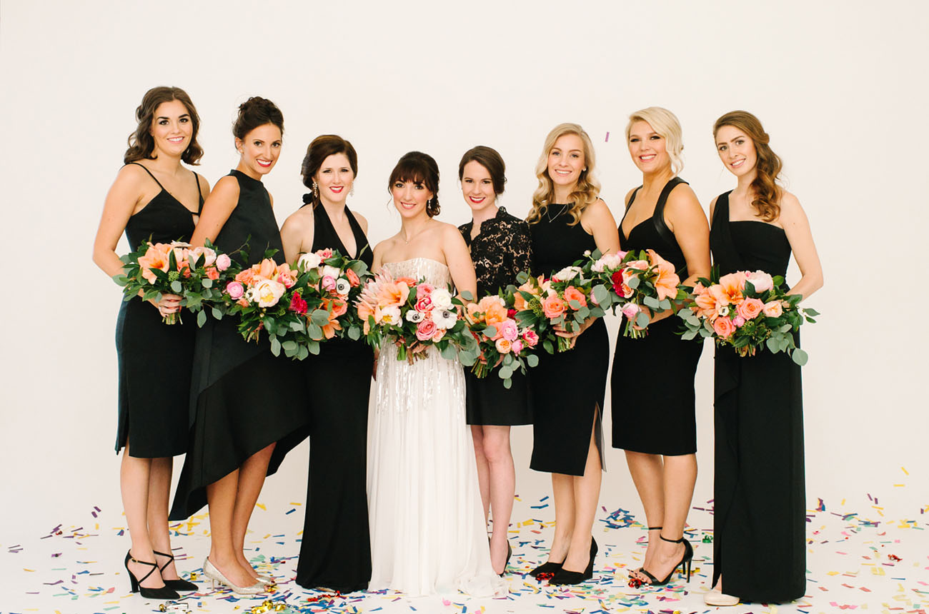 The bridesmaids in black highlighted the bride wearing a sequin gown