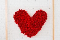 DIY red napkin heart backdrop