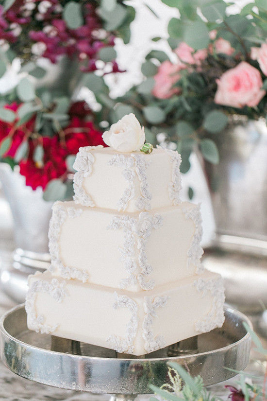 The adorable white cake was decorated with a single bloom
