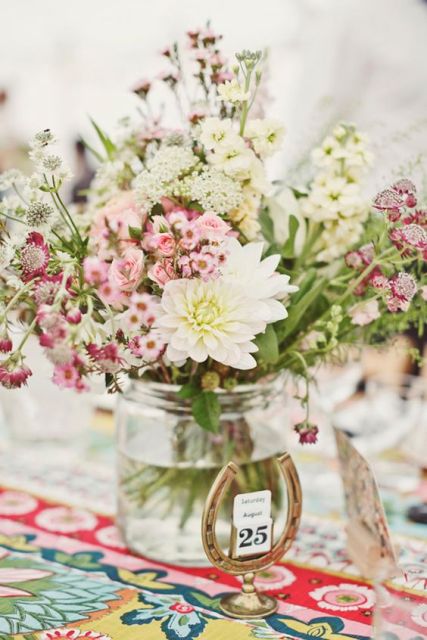 Table centerpiece with pink waxflowers