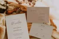 a grey and taupe minimalist wedding invitation suite with calligraphy and black lettering is a great idea for a minimal wedding