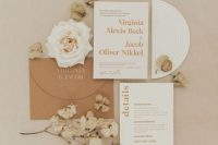 a neutral wedding invitation suite in rust and white is a lovely idea for a neutral boho fall wedding