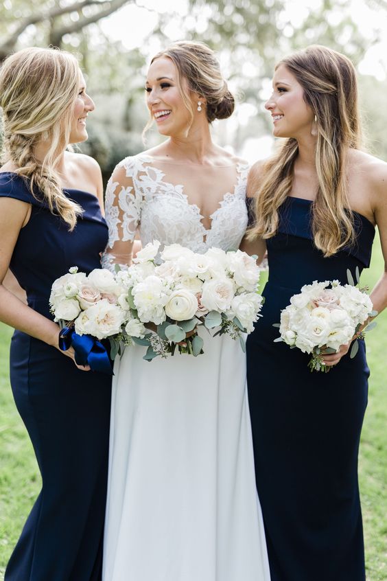 a refined off the shouldern and one shoulder navy maxi bridesmaid dresses for a formal wedding in any season