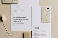 a stylish contemporary to minimalist wedding invitation suite in white and tan, with stylish black letters and letter pressing is chic