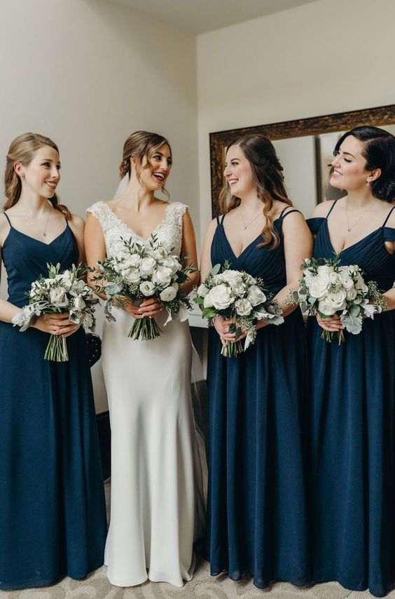 beautiful and chic navy maxi bridesmaid dresses with draped bodices and plated skirts are great for summer or fall
