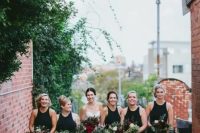 black halter neckline maxi bridesmaid dresses with slits paired with black shoes are elegant