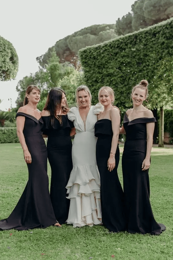 black off the shoulder and strapless mermaid wedding dresses with trains are very refined and chic