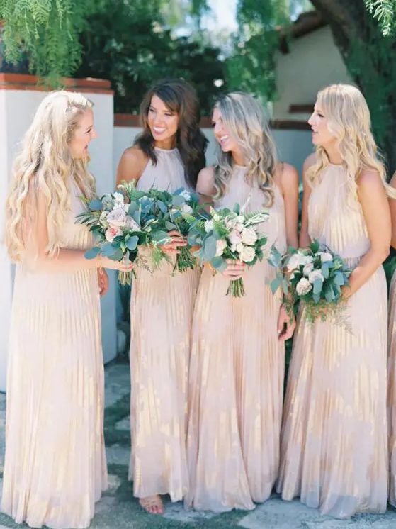 blush maxi gowns with metallic detailing and halter necklines are a dreamy and lovely idea for a spring or summer wedding