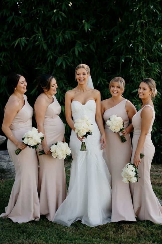 blush one shoulder mermaid bridesmaid dresses are a cool idea for a neutral formal wedding in spring or summer