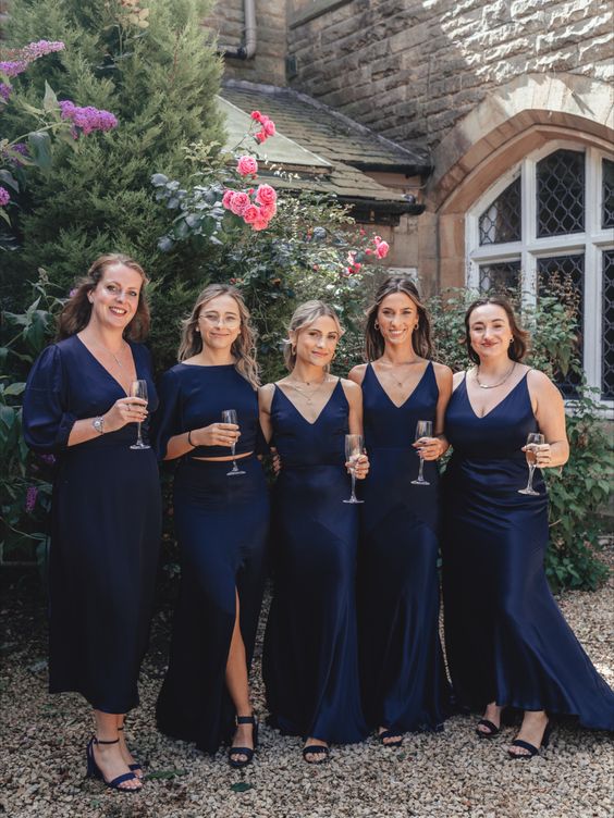 cool midi and maxy navy bridesmaid dresses paired with black shoes are a super chic idea for fall or winter