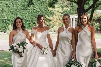 elegant and trendy halter neck midi white bridesmaid dresses for a modern neutral wedding in spring or summer