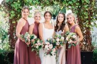 elegant mauve halter neck maxi bridesmaid dresses with pleated skirts are a chic idea for a summer or summer to fall wedding