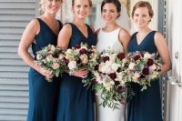 elegant maxi navy mermaid bridesmaid dresses with V-necklines are perfect for a stylish fall wedding