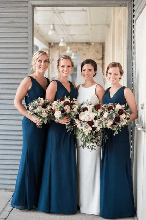 Elegant maxi navy mermaid bridesmaid dresses with V necklines are perfect for a stylish fall wedding