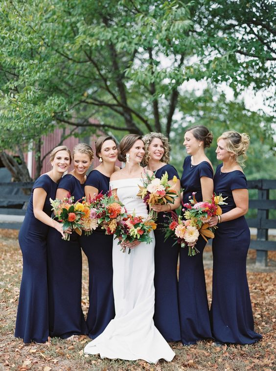high neckline navy mermaid bridesmaid dresses are a cool idea for a sophisticated wedding