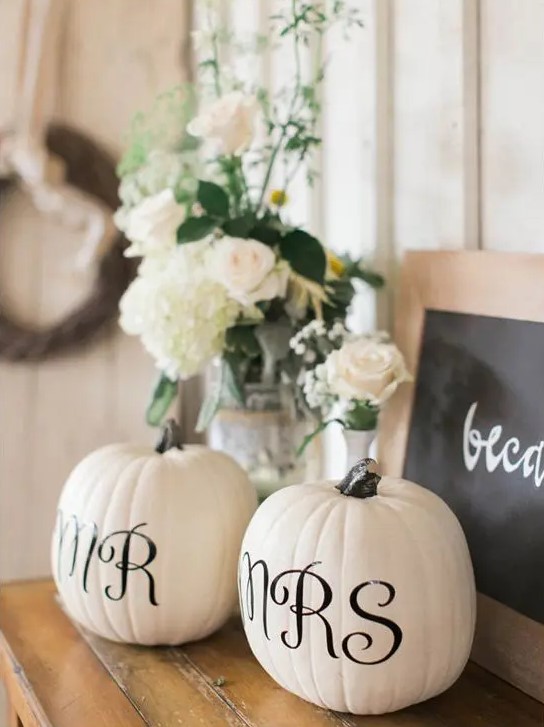 make simple fall pumpkin wedding decor painting letters and monograms on them, this is a fast and cool DIY