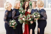 matching navy lace mermaid bridesmaid dresses with slits and long sleeves for a bold holiday wedding