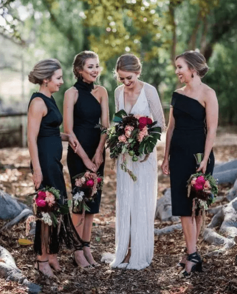 mismatching black knee dresses with black strappy heels for a bold bridesmaids’ look