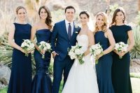 mismatching formal navy maxi bridesmaid dresses are a great idea for a formal wedding, they always look great