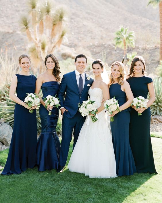 mismatching formal navy maxi bridesmaid dresses are a great idea for a formal wedding, they always look great