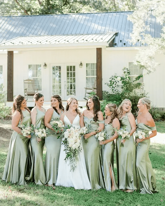 mismatching light green maxi bridesmaid dresses with side slits are chic for spring and summer