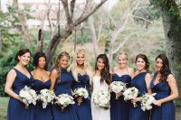 mismatching navy maxi bridesmaid dresses are always a cool and catchy solution for a formal wedding