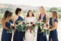 mismatching navy maxi bridesmaid dresses are gorgeous for a bold fall wedding, they always look chic