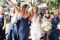 mismatching navy maxi bridesmaid dresses with nude shoes are a cool idea for spring or summer