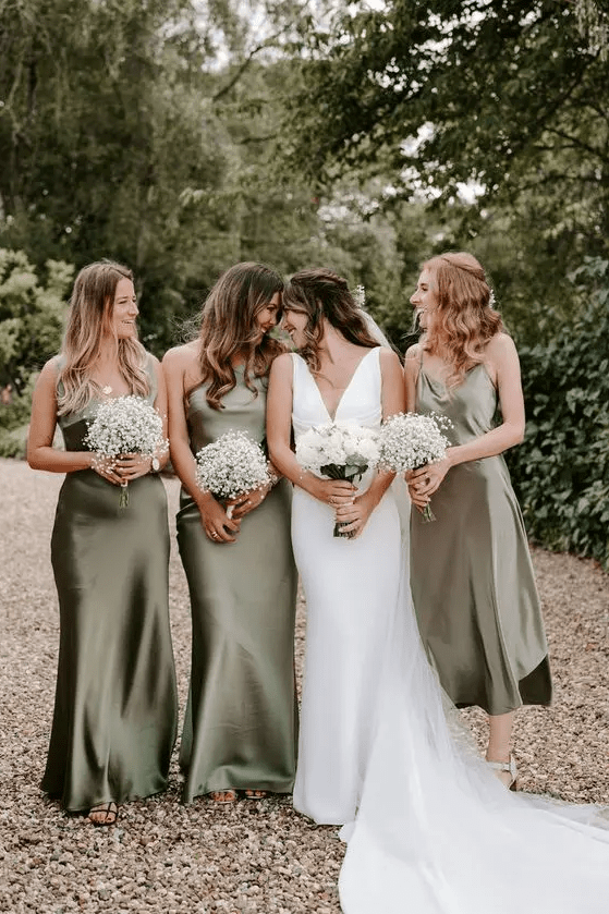 mismatching olive green mid and maxi bridesmaid dresses are an elegant and delicate option for a spring or summer wedding