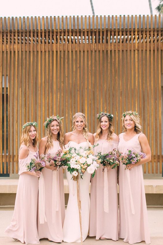 mix and match blush maxi bridesmaid dresses with halter and other necklines are a cool solution for a delicate wedding with pastels