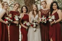 mix and match burgundy maxi bridesmaid dresses with various necklines are a hot idea for fall nuptials