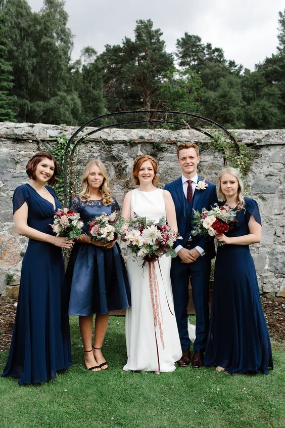 mix and match knee and maxi navy bridesmaid dresses are a cool solution for a fall or winter wedding