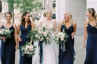 navy draped A-line bridesmaid dresses and a white wedding dress will keep your wedding color scheme up