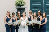 navy mermaid maxi bridesmaid dresses with straps and square necklines are a super chic modern idea for a wedding