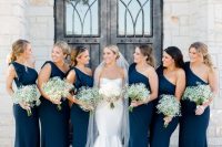 one shoulder mermaid navy bridesmaid dresses plus baby’s breath bouquets are a timeless combo for a wedding