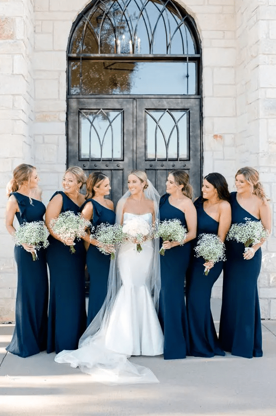 one shoulder mermaid navy bridesmaid dresses plus baby’s breath bouquets are a timeless combo for a wedding