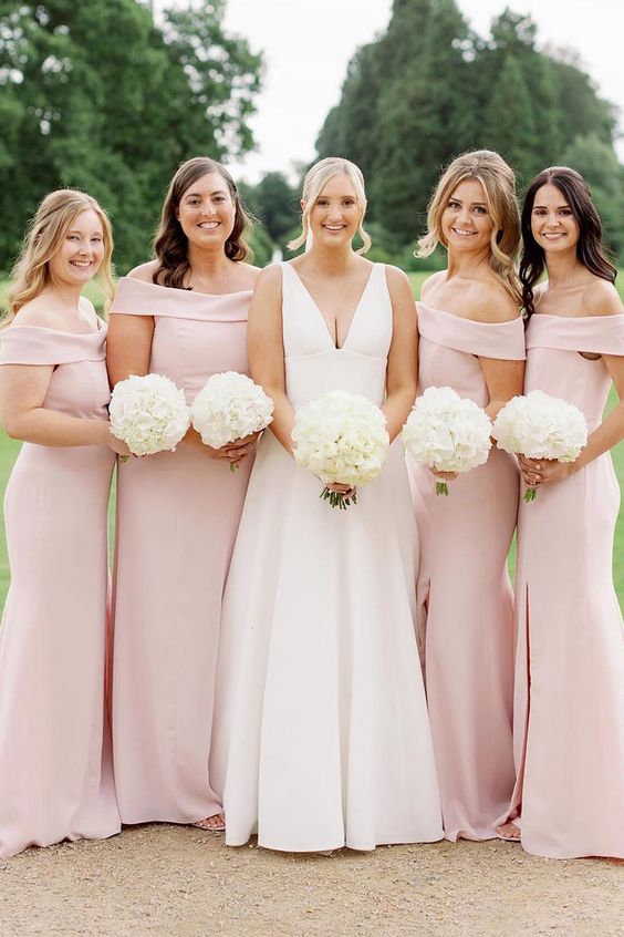 refined and delicate blush off the shoulder bridesmaid maxi dresses are a cool idea for spring