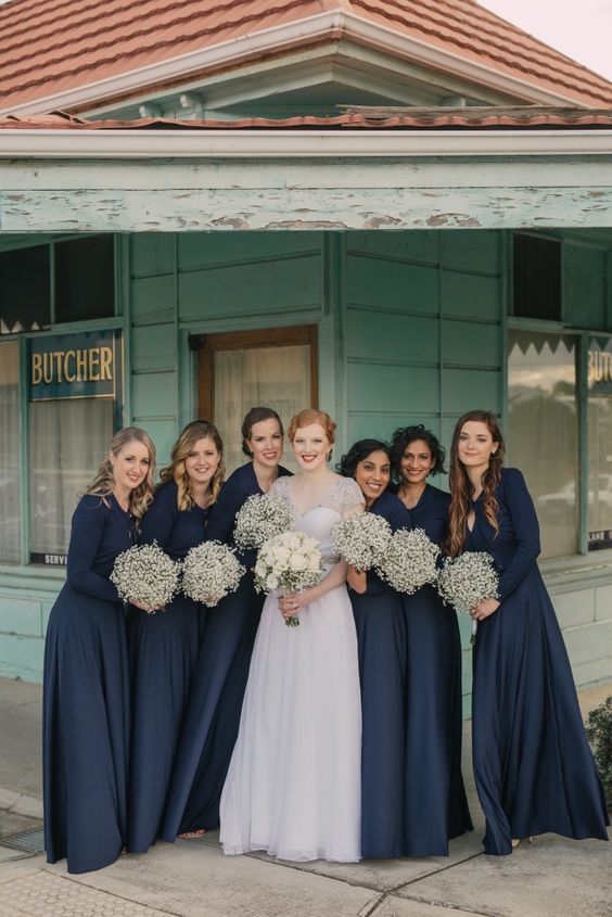 refined navy maxi bridesmaid dresses with long sleeves and baby's breath bouquets for a contrast are wow