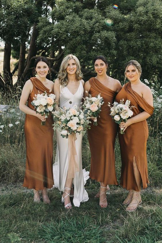 rust-colored midi one shoulder bridesmaid dresses, nude shoes are a cool and chic combo for a fall wedding