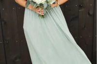 simple pastel green bridesmaid’s dress with a halter neckline is always a good idea for a sping or summer wedding