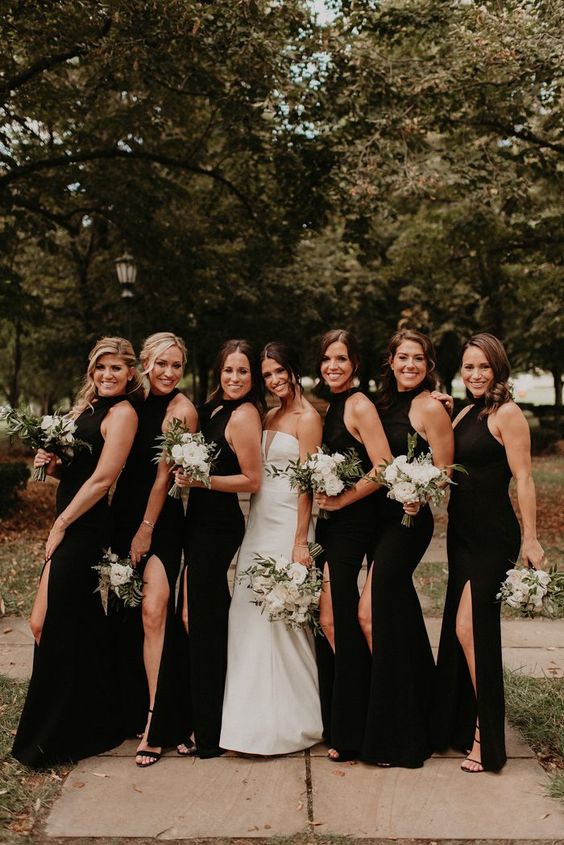 sophisticated black halter mermaid bridesmaid dresses with black shoes are extremely chic and cool