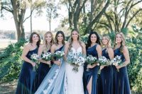 sophisticated navy velvet maxi bridesmaid dresses with thigh high slits are fantastic for any wedding