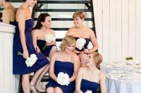 strapless navy A-line bridesmaid dresses and white bouquets for a bold nautical wedding