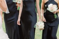 stylish black halter neck maxi bridesmaid dresses and black shoes are a timeless idea for any modern wedding