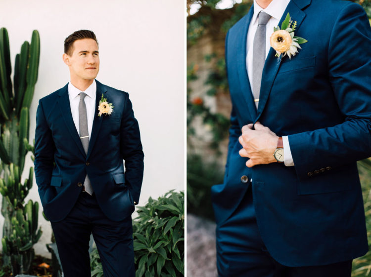 The groom was rocking a navy suit, colored suits are a hot trend