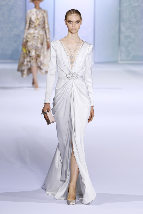 Ralph&Russo minimalist wedding dress with a plunging neckline and delicate detailing