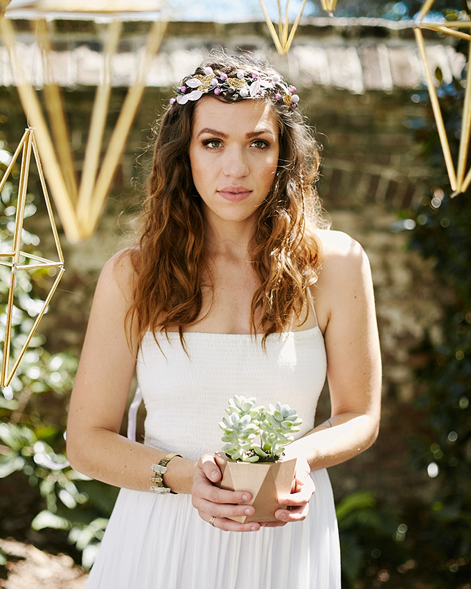 The bride rocked a beaded headpiece in the same colors as her bouquet