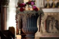 07 candles and flowers in a vintage urn